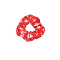 Red scrunchie with white star pattern made of soft fabric for festive hair styling - Red Scrunchie