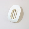 Flat oval hair clip in solid white plastic with three vertical cutout slots - Oval Clip (Bulk) / Glossy Off-White