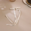 Elegant white satin bow hair clip with long ribbons and metal duckbill attachment - Milk White