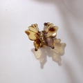Elegant hollow butterfly hair claw clip with amber tortoiseshell pattern and gold spring - 5cm / Brown
