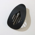 Matte black geometric hair clip with oval shape and unique hollow triangle design - Matte Black (Bulk)