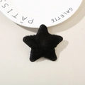Pince à cheveux étoile en peluche noire avec texture douce en fausse fourrure femme - Noir