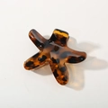 Star-shaped hair claw clip in classic tortoiseshell pattern with high-gloss finish - Glossy Yellow Leopard