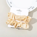 Set de dos coleteros de seda satinada color champán en tarjeta para peinados elegantes - Amarillo Leche