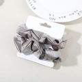 Gray satin silk hair scrunchie with metallic luster on white display card packaging - Dark Gray