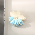 Matte floral hair claw clip with blue and white lily of the valley flower cluster design - Blue
