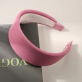 Cerchietto largo in maglia viola rosato con trama a coste verticali su rivista Vogue - Rosso anguria