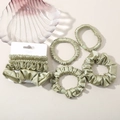 Detailed set of 8 sage green satin scrunchies in various sizes for stylish hair styling - Matcha Green