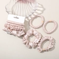 Champagne satin silk hair scrunchies and ties set in elegant glassware presentation - Lotus Pink