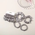 Detailed view of silver satin hair scrunchies set with 5 pieces in various sizes - Dark Gray
