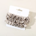 Lot de trois chouchous en satin doré champagne avec détails plissés élégants - Gris Chaud
