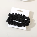 Three-piece set of elegant black faux silk scrunchies on a white display card - Black