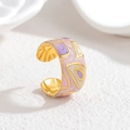 Close-up of adjustable enamel wide ring with pastel geometric patterns on gold plating - Purple Pink Cream Geometric Style (S-R880-zi)