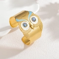 Bracelet manchette hibou doré artistique avec émail bleu et détails en nacre irisées - Bleu
