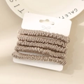 Set of 5 champagne silk satin pleated scrunchies on white display card for women - Warm Gray