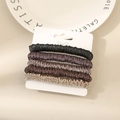 Five-piece earth-toned satin scrunchie set with smooth silk texture on display card - Dark Mixed Colors