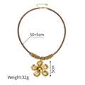 Brown leather cord necklace featuring a large golden textured flower pendant and gold rings - Large Gold Flower (M-N2306) / 50+5cm