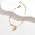 Detail of gold stainless steel bracelet with mushroom charm and heart zircon stone - Mushroom Style (OLBB1307-mogu)