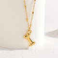Elegante collana in acciaio inossidabile dorato con ciondolo a osso e perline su supporto - Collana Osso (S-N2311-B)