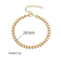 Dettaglio del braccialetto a catena con foglie dorate, chiusura a moschettone ed estensione - Bracciale