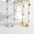 Irregular baroque pearls and metallic beads layered necklace in gold and silver finish - Necklace N2294 / Steel