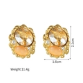 Detailansicht der goldenen Vintage-Ohrringe mit orangefarbenen Steinen und 2,1 cm Größe - Gold
