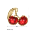 Detailed view of cherry brooch with red resin fruit and golden leaf showing 4cm width - Broad Leaf Dual Cherry