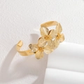 Retro Armreif aus Edelstahl mit dreidimensionalen goldenen Blütenblättern in Breitband-Optik - Bangle