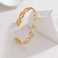 Elegant gold stainless steel cowrie shell bangle with white enamel inlay on a stone stand - White (S-B1324-bai)