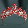 Detailed view of Baroque bridal crown with red crystals and gold floral rhinestone motifs - KC Gold White Diamond + Large Red Diamond