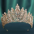 Macro view of champagne crystals and gold filigree on a baroque bridal crown - KC Gold Tone With Champagne Rhinestone