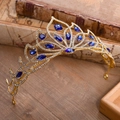 Detailed view of vintage gold bridal crown with deep blue crystals and white rhinestones - Gold Tone with Royal Blue Crystal