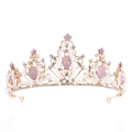 Elegant gold bridal tiara with pink crystals and pearls on white background - Gold Base Pink Rhinestone
