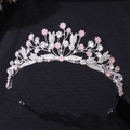 Detailed macro view of silver leaf crown with pink crystals and rhinestones for brides - Thick Silver Pink Opal