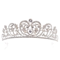 Close-up of elegant silver bridal tiara with sparkling rhinestones and leaf patterns - Thick Silver White Rhinestone