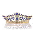 Detailed view of golden tiara with blue and white rhinestones and elegant mirror reflection - Gold Blue Rhinestone