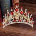 Golden baroque bridal crown featuring red crystal rhinestones and leaf pattern design - Gold / Red Rhinestone