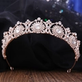 Elegant rose gold bridal crown featuring rhinestones and symmetric round crystal accents - Rose Gold With White Rhinestones (H1188)