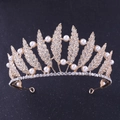 Detailed view of leaf crown with gold metal, sparkling rhinestones and white pearls - KC Gold White Rhinestone