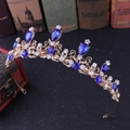 Detailed close-up of a vintage gold crown featuring teardrop blue rhinestones - Gold Frame With Blue Gem (KC Royal Blue)