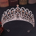 Close-up of rose gold bridal crown with champagne crystals and intricate diamond settings - Rose Gold Peach Rhinestone
