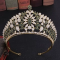 Detailed macro view of vintage gold crown with emerald green and white rhinestones - Gold Base Green Rhinestone