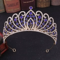 Detail of luxury baroque bridal crown with blue gemstones and sparkling crystals - Gold with Blue Rhinestones