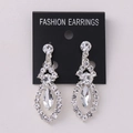 Detailed view of silver alloy tassel earrings with sparkling clear crystals and marquise stones - Silver Color White Rhinestone (Post)