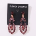 Elegant rose gold drop earrings with purple crystals and marquise stones on white background - Antique Copper Purple Rhinestone (Clip-on)