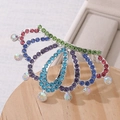 Dettaglio del pettine a corona con strass colorati su base in legno e finiture fini - M / Argento Colorato