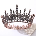 Close-up of Baroque crown with rose gold leaf frame and dark crystals on white background - Antique Copper Black Rhinestone