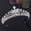 Detailed 45-degree side view of bridal crown with rhinestones and white pearls - Thick Silver White Rhinestone