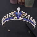 Detailed macro of golden bridal crown with blue crystals, white pearls and sparkling zircons - Gold with Blue Rhinestones