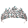 Detailed macro view of baroque vintage leaf crown with emerald and gray crystals - Antique Gold Green Zircon